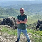 Николай